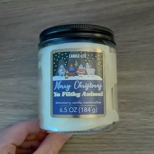 Brand new Candle Lite “Merry Christmas Ya Filthy Animal” scented candle